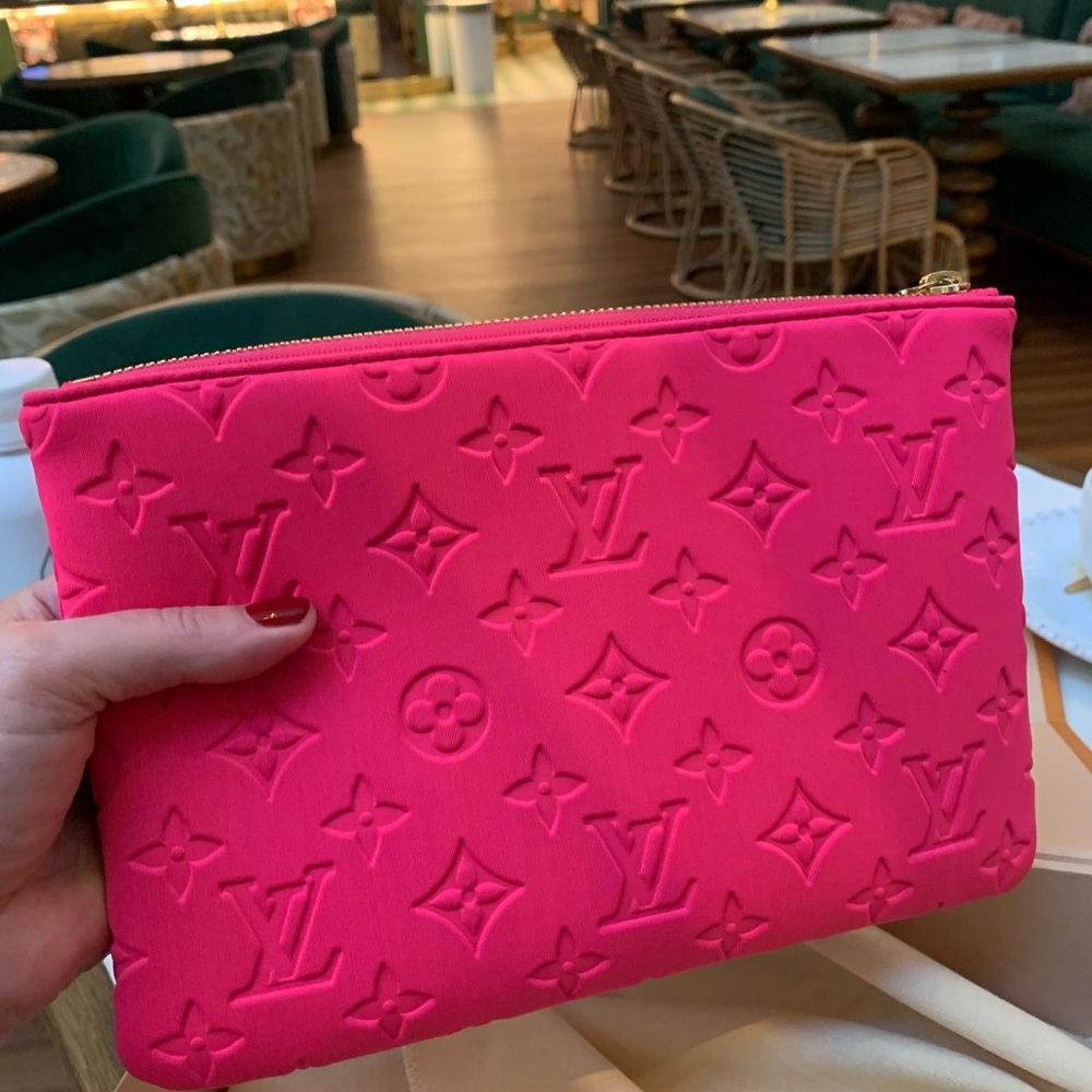 Authentic limited edition Louis Vuitton rare bright pink  soft logo pouch .Must!